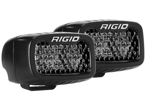 Photo of a pair of Rigid's black Midnight Edition SR-M Series light pods with spot optics and diffused Lenses