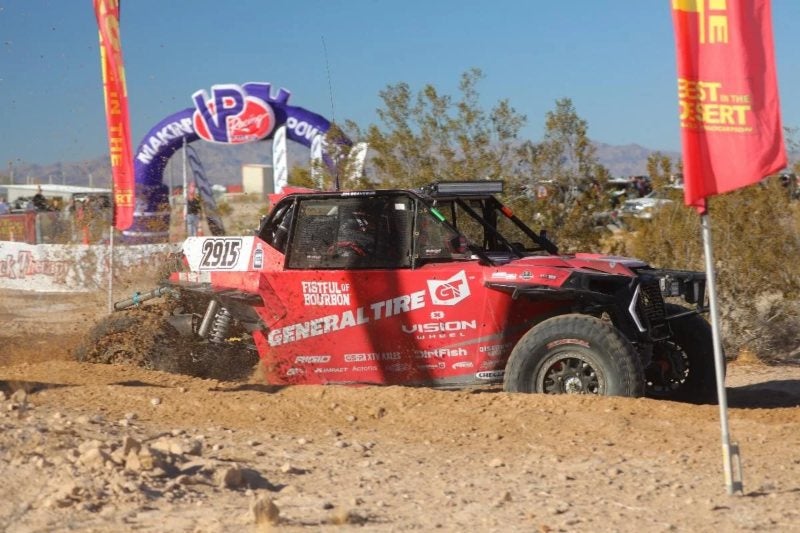 Jim Beaver's off-road vehicle driving down track at Vegas to Reno race