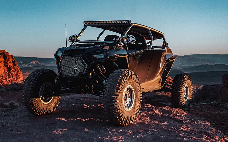 Angled front view of UTV with RIGID lights